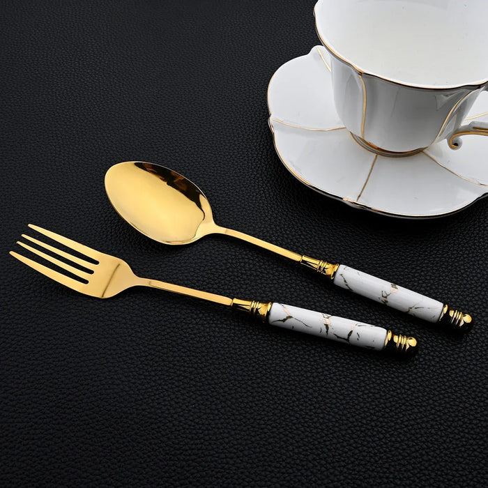 16 Piece Stainless Steel Cutlery Set With Ceramic Handle And Gold Finish