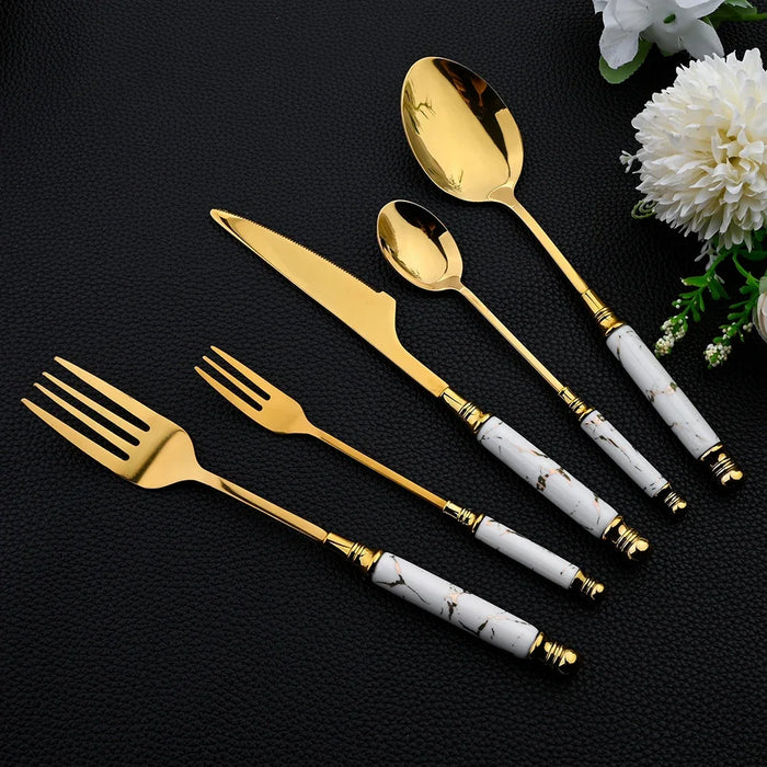 16 Piece Stainless Steel Cutlery Set With Ceramic Handle And Gold Finish