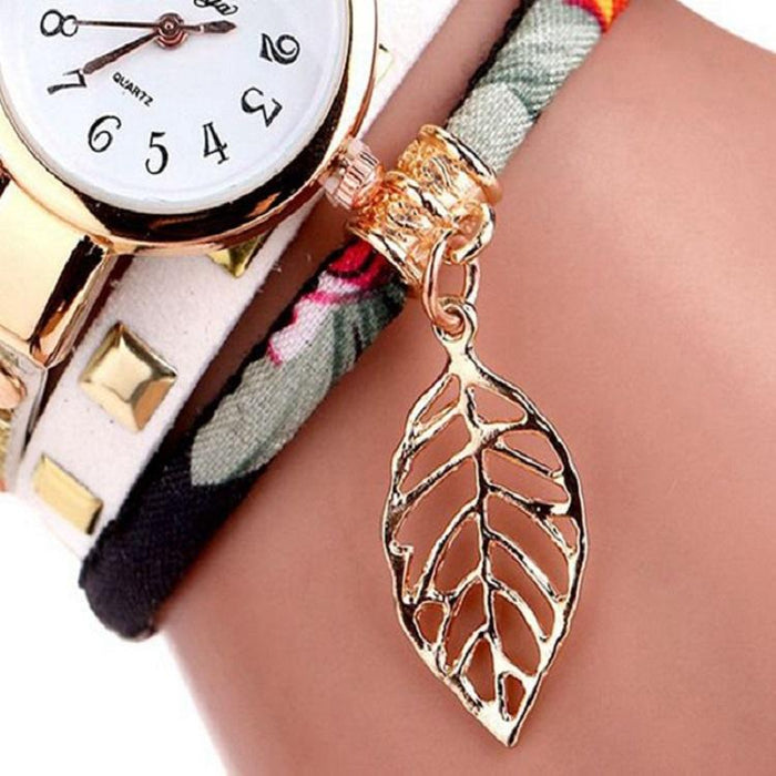 Women Quartz Bracelet Watch With Leaf Shape Pendant