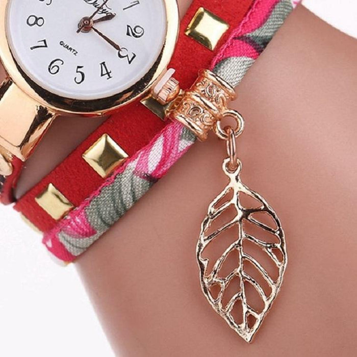 Women Quartz Bracelet Watch With Leaf Shape Pendant