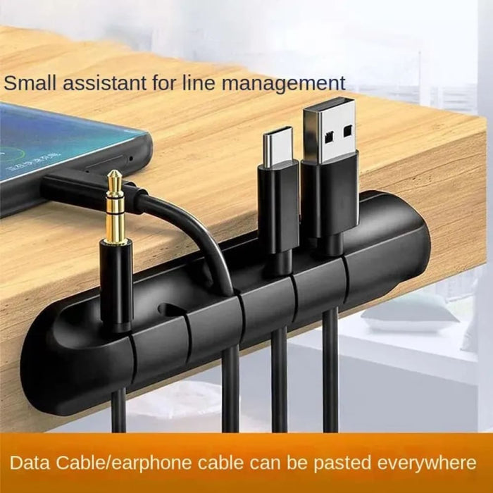 Adhesive Cord Manager For Mobile Devices