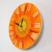 Close-up of Beautiful Orange Gerber Deorative Clock