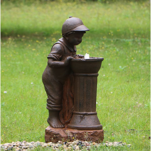 Boy At Water Fountain